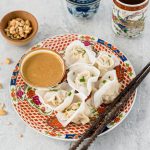 Steamed Pork Dumplings with Peanut Sauce
